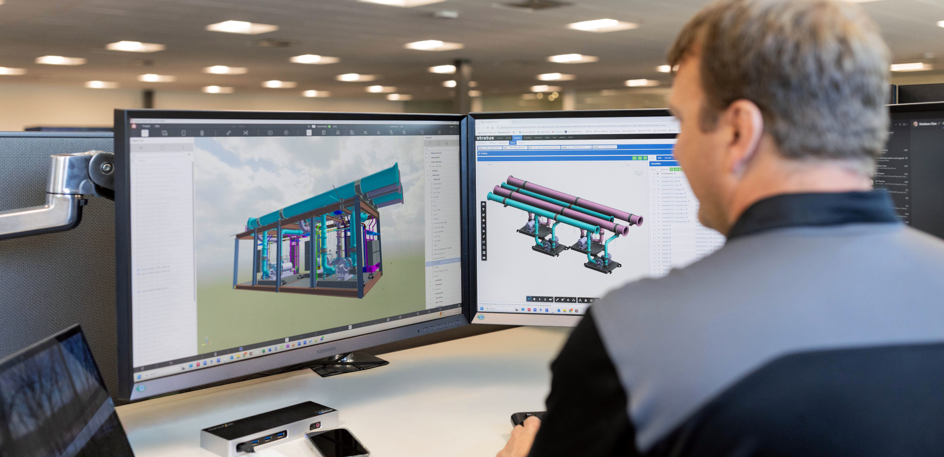 Person at a computer using BIM/VDC Software